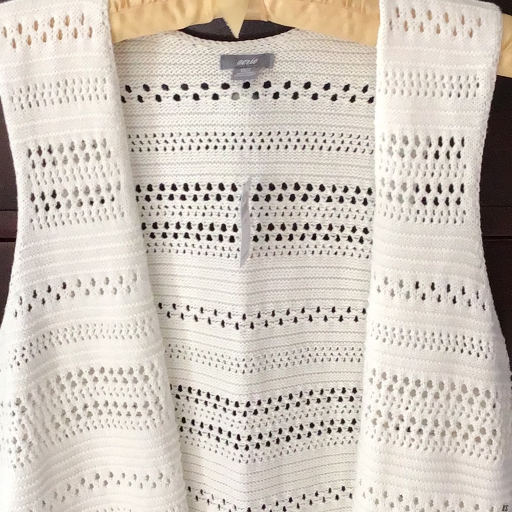 Sleeveless duster
